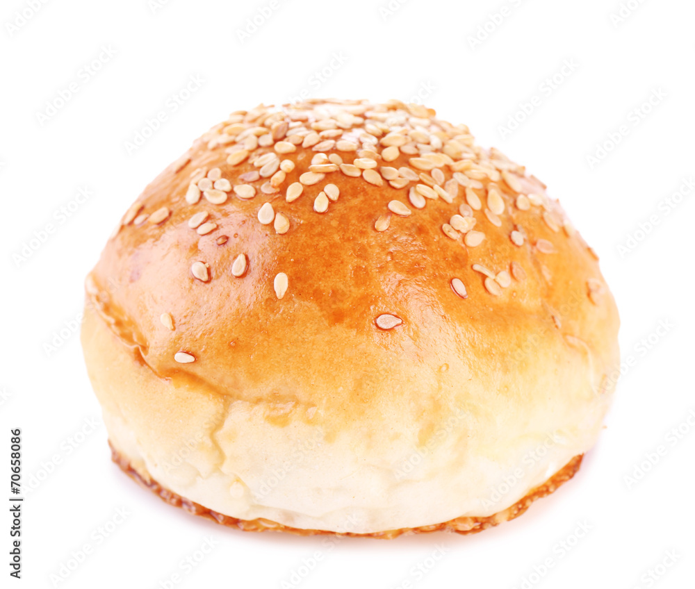 Tasty bun with sesame isolated on white