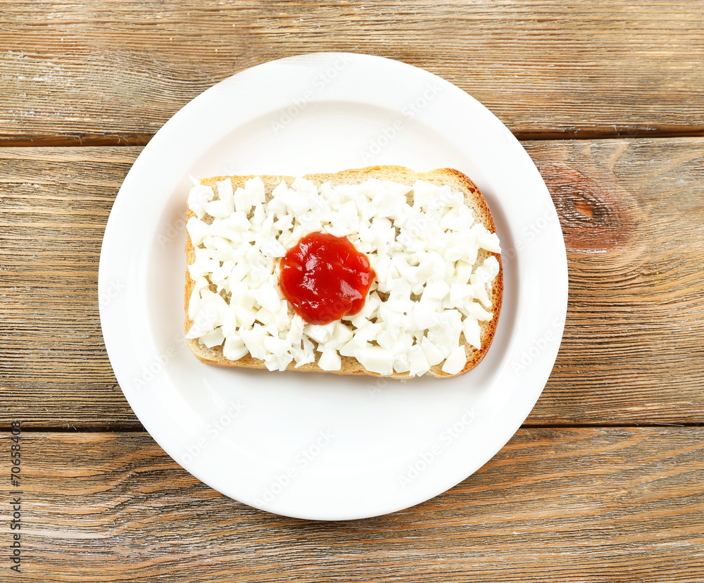 Sandwich with flag of Japan on table close-up