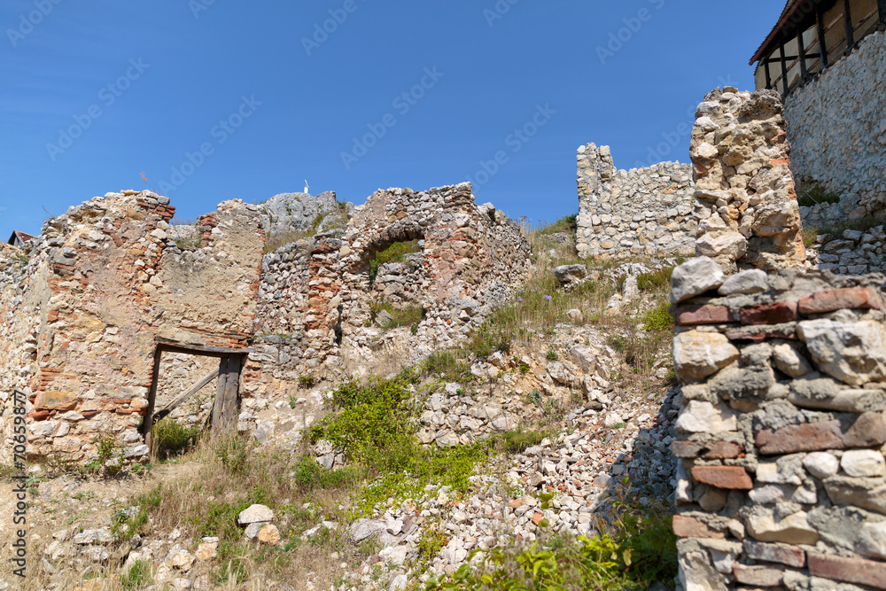 Detail of destroyed ruined walls of medieval Rasnov citadel in R