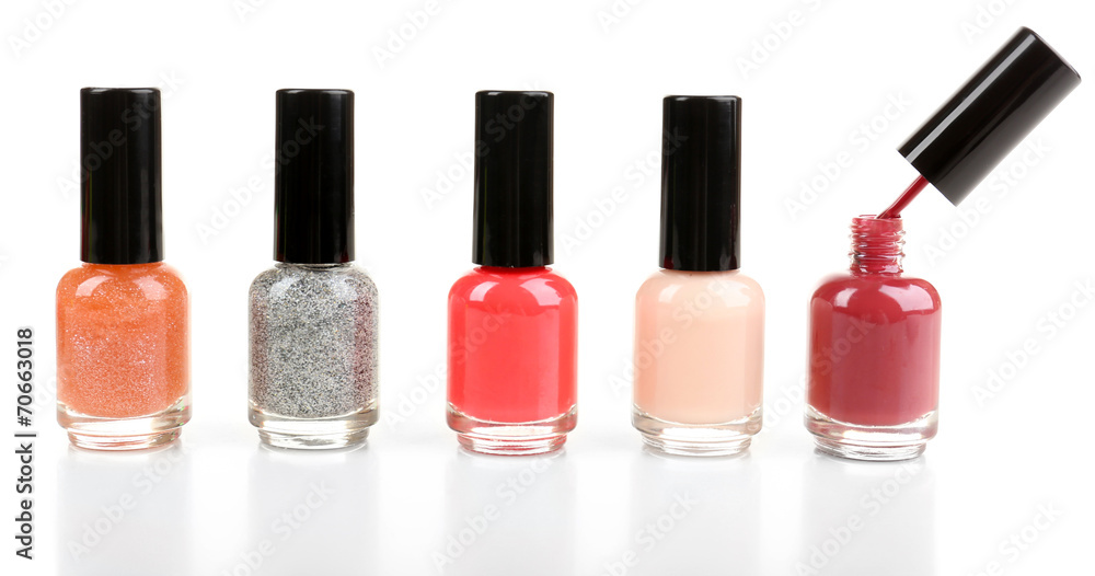 Colorful nail polishes isolated on white Colorful nail polishes isolated on white