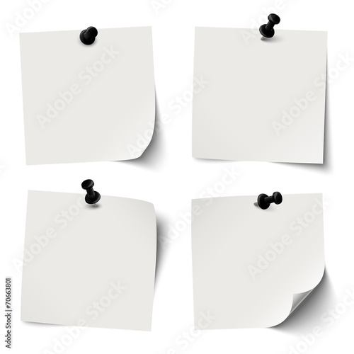 collection of colored sticky papers with black pin needle