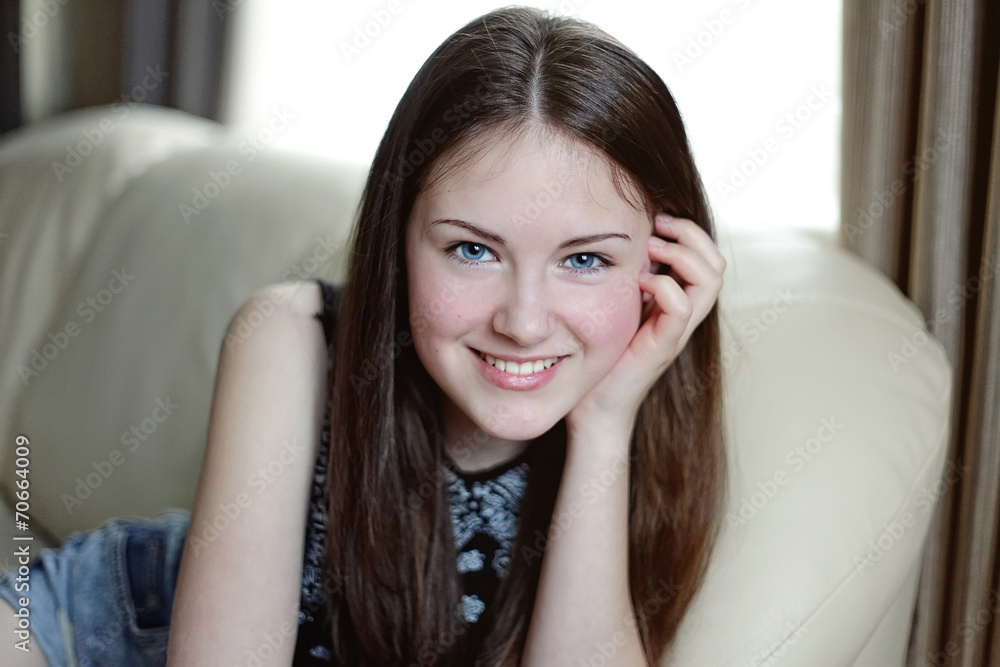 A young girl smiling A young girl smiling