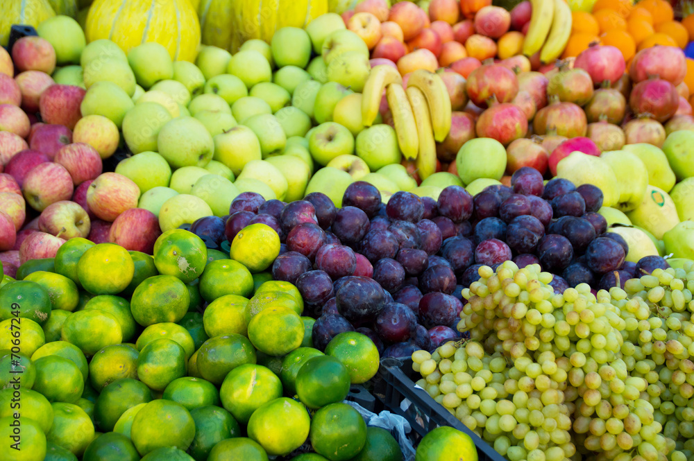 Variety of fresh organic fruits on the street stall Variety of fresh organic fruits on the street stall