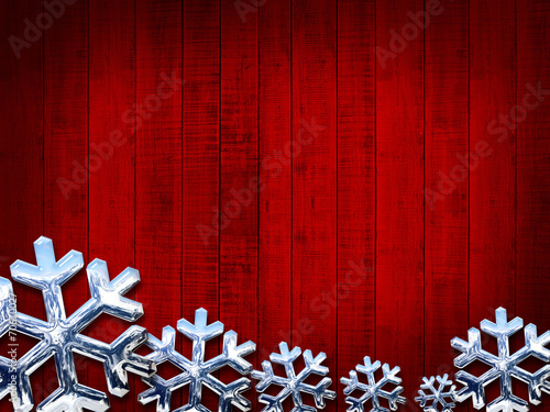 Christmas snowflakes silver and red wood background