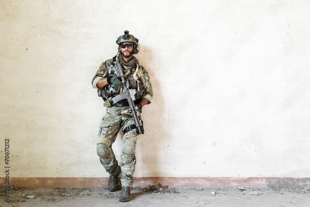 Fototapeta premium american soldier poses during military operation