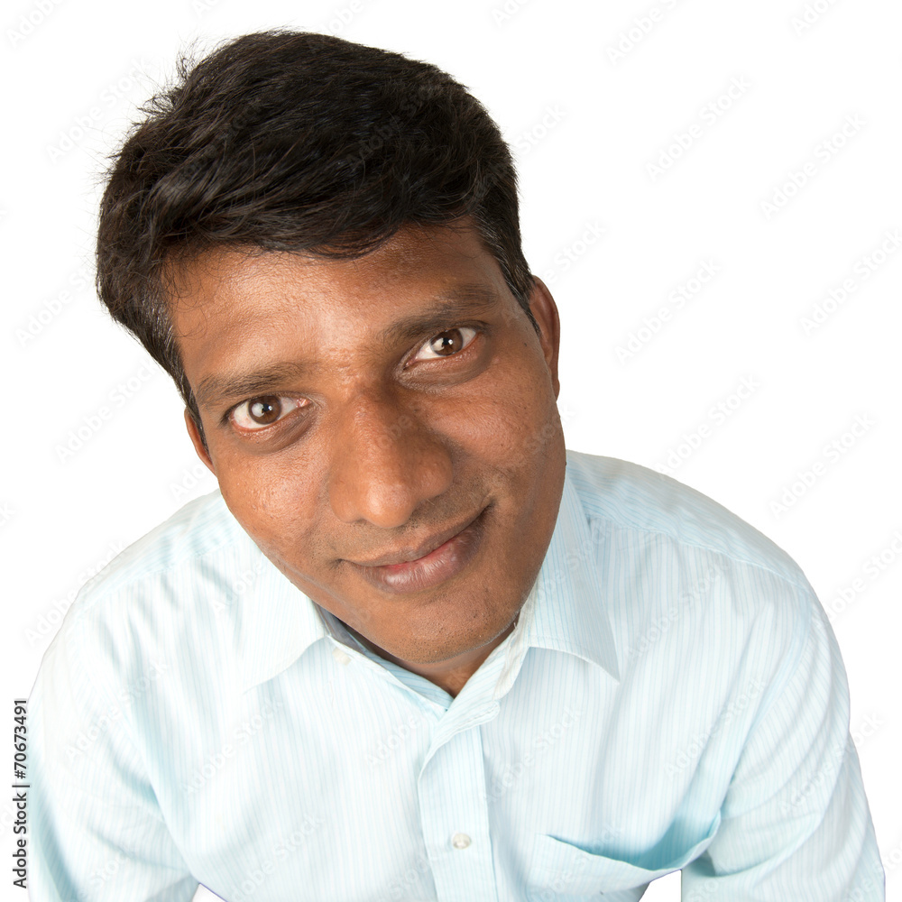 A worried Indian / South Asian business executive - isolated A worried Indian / South Asian business executive - isolated