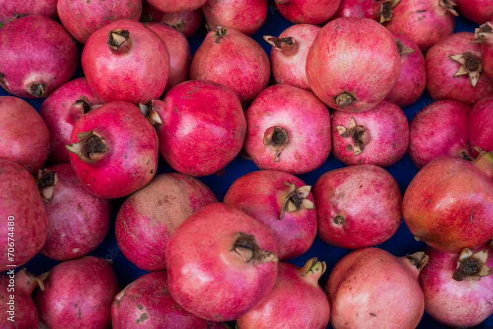 group of pomegranates. pomegranate closeup, background group of pomegranates. pomegranate closeup, background