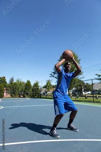 Basketball Player Shooting © ArenaCreative