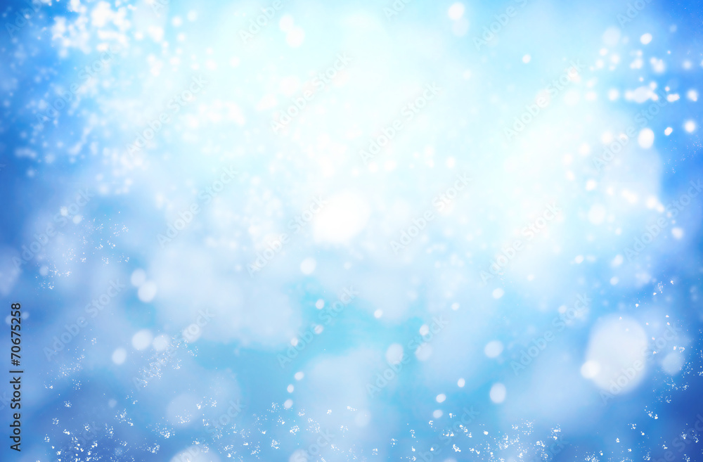 Winter background with lots of snowing white bokeh