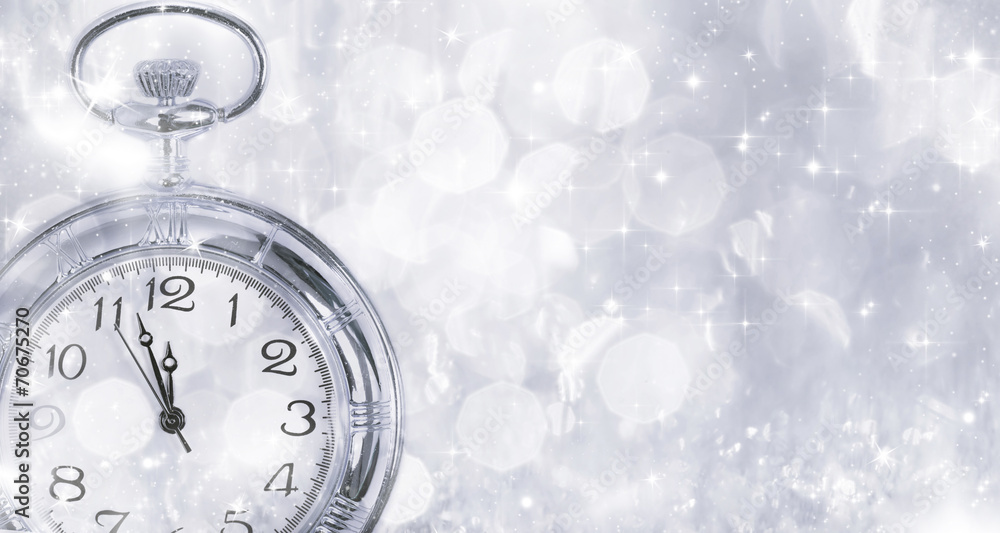 New Year's at midnight - Old clock and holiday lights New Year's at midnight - Old clock and holiday lights