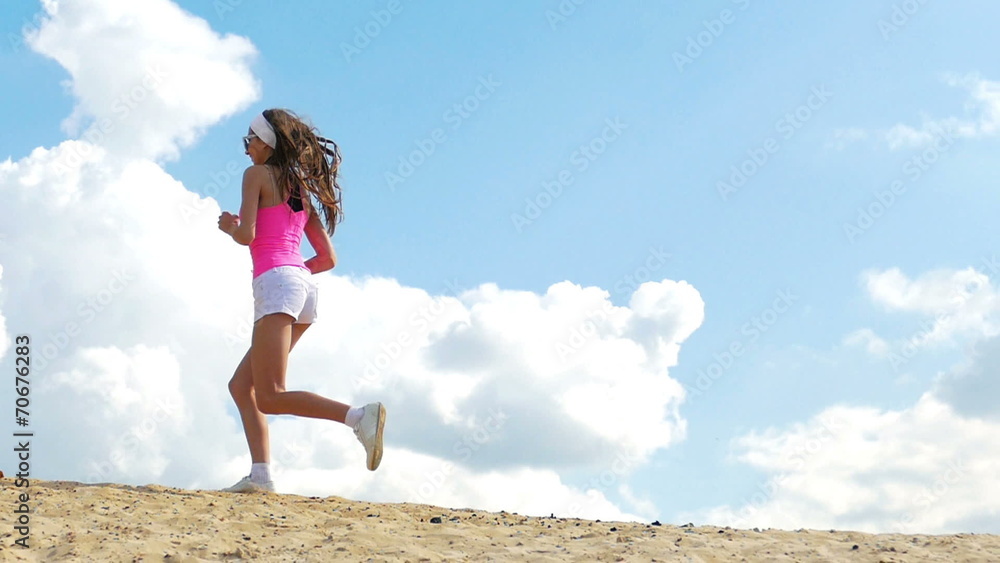 girl is engaged in sports jogging