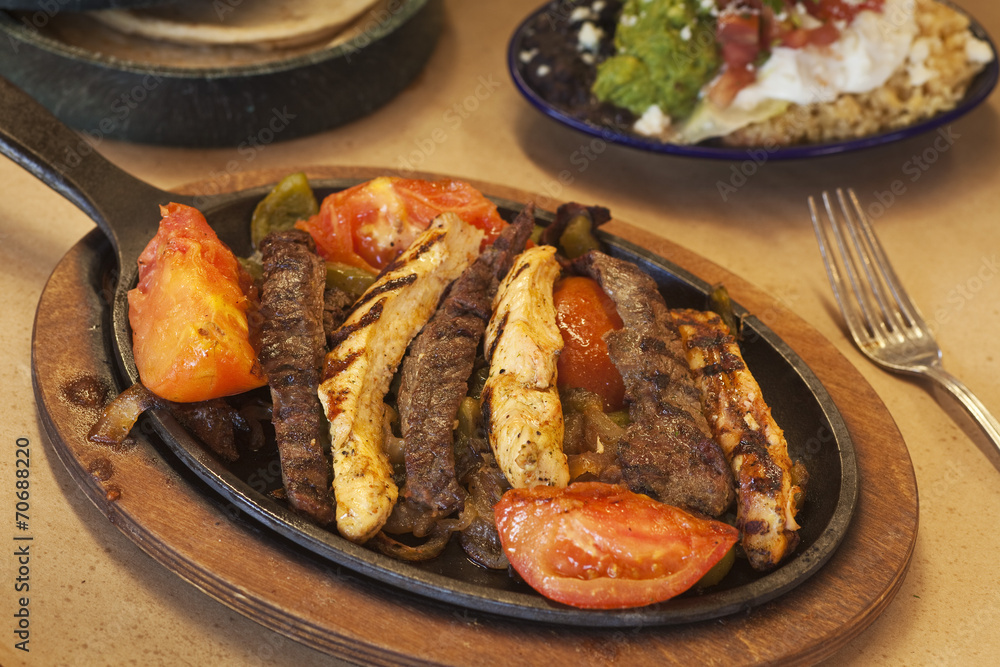 steak and chicken fajitas with gucamole steak and chicken fajitas with gucamole
