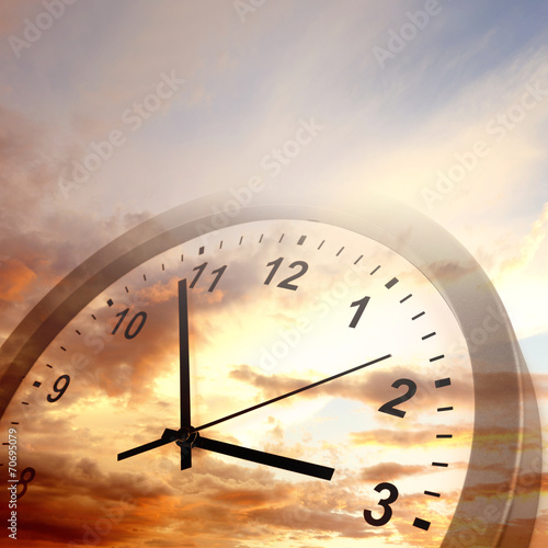Time passing clock in sky