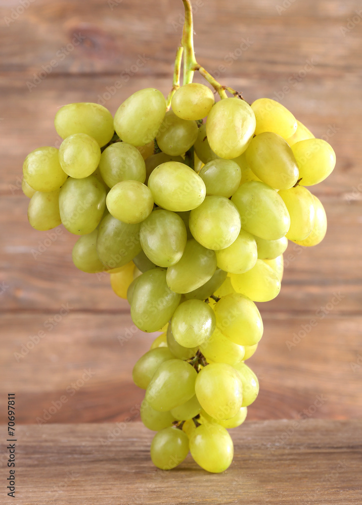 Bunch of grape on wooden background Bunch of grape on wooden background