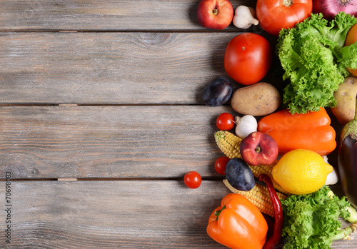 Fototapeta Naklejka Na Ścianę i Meble -  Fresh organic fruits and vegetables on wooden background