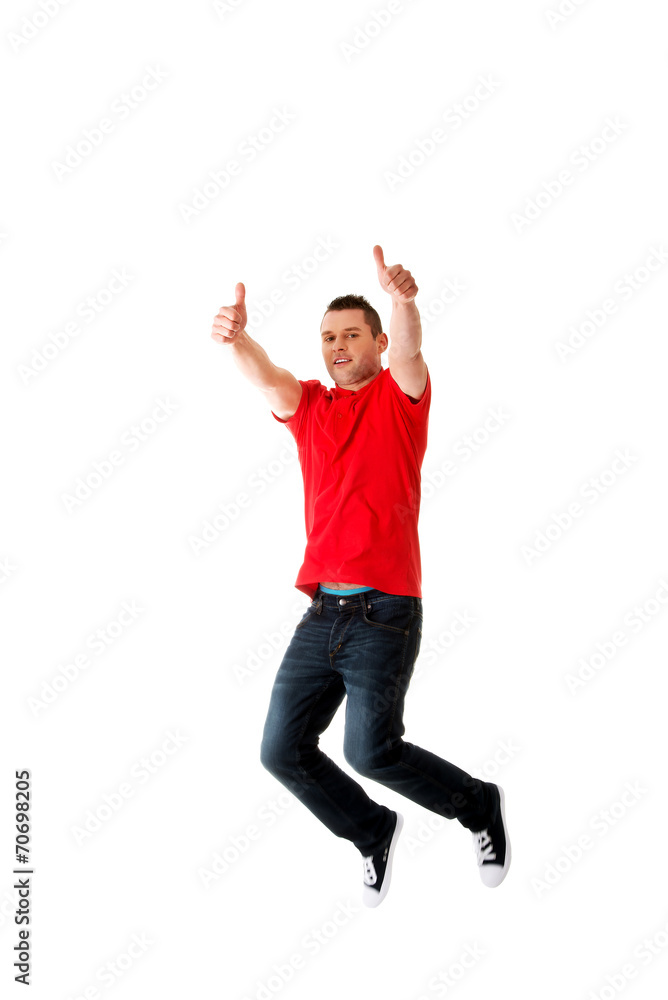 Young casual man jumping. Young casual man jumping.