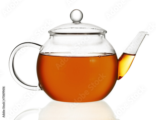 Teapot with tea isolated in white background