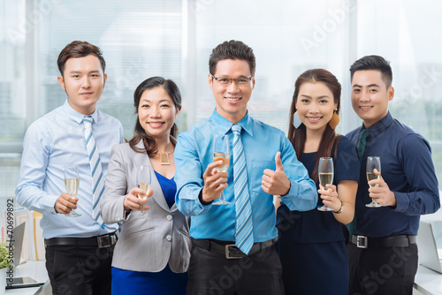 Cheerful Asian business team