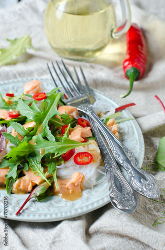 Salad with rice noodles and salmon photo