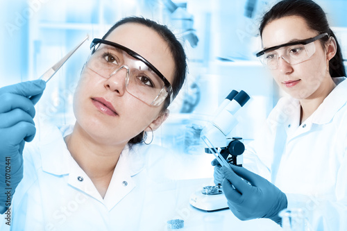 woman laboratory assistant in the laboratory of food quality