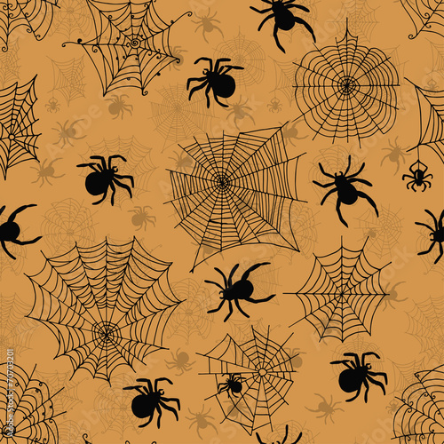 Vector seamless pattern with spiders on an orange background
