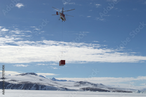 helicopter in the sea of antarctic
