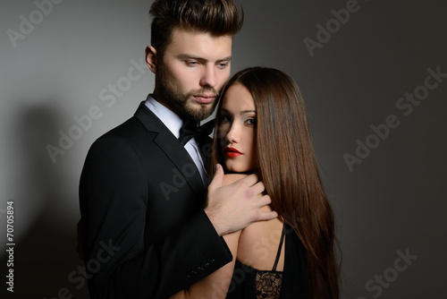 Sexy passion couple in love. Portrait of beautiful young man and