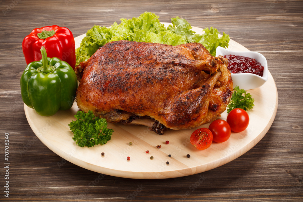 Roast duck on cutting board Roast duck on cutting board