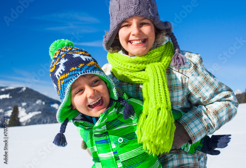 Happy kids playing winter photo