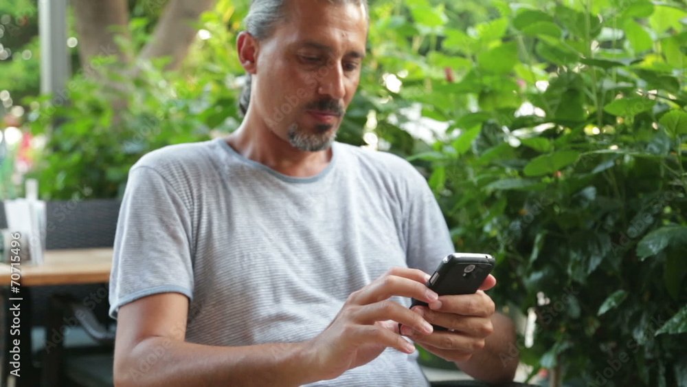 Man Using a Smart phone Man Using a Smart phone
