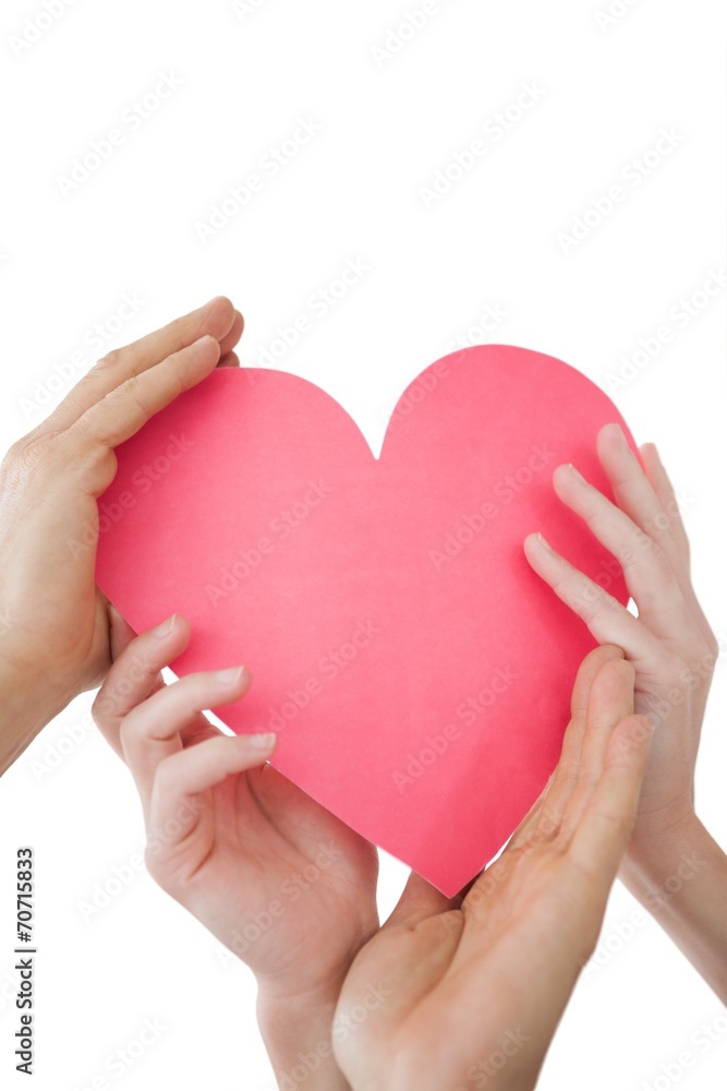 Close up of hands holding heart Close up of hands holding heart