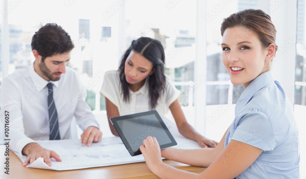 Fototapeta premium Businesswoman looking at the camera