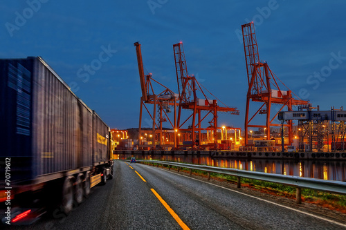 Truck transport container on the road to the port.