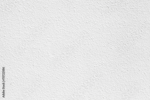White concrete wall with plaster. Background photo texture © evannovostro
