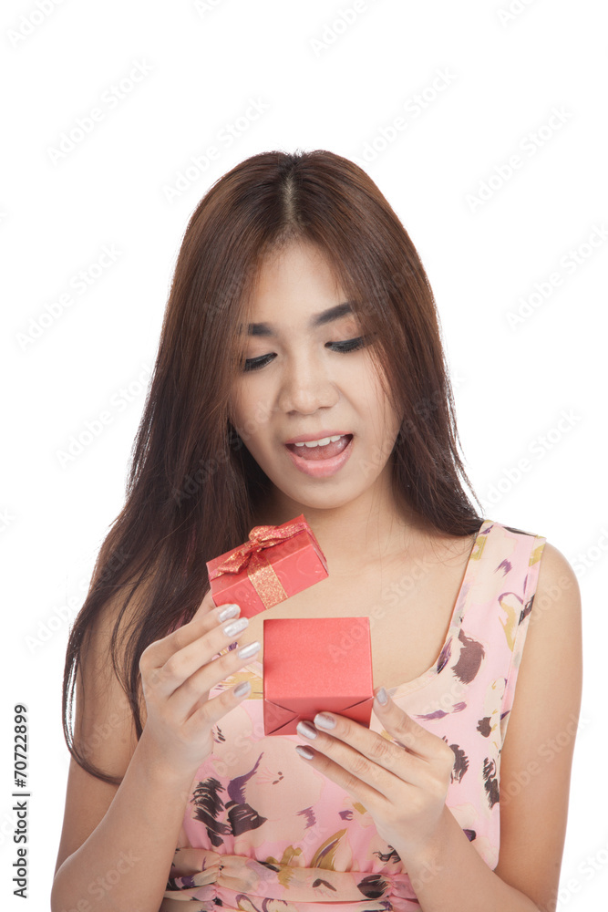 Excited beautiful Asian woman open a red gift box Excited beautiful Asian woman open a red gift box