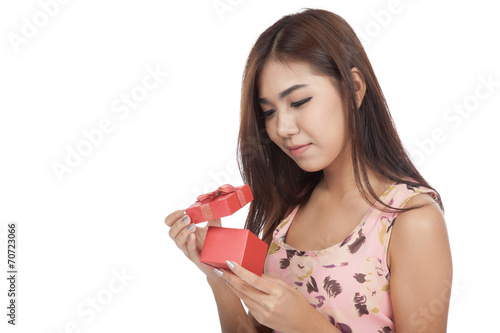 Beautiful Asian woman open a red gift box
