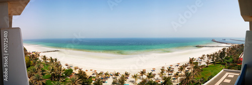 The panorama of beach and turquoise water of the luxury hotel, A photo