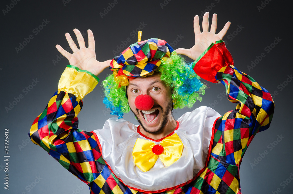Funny clown in colourful costume Funny clown in colourful costume