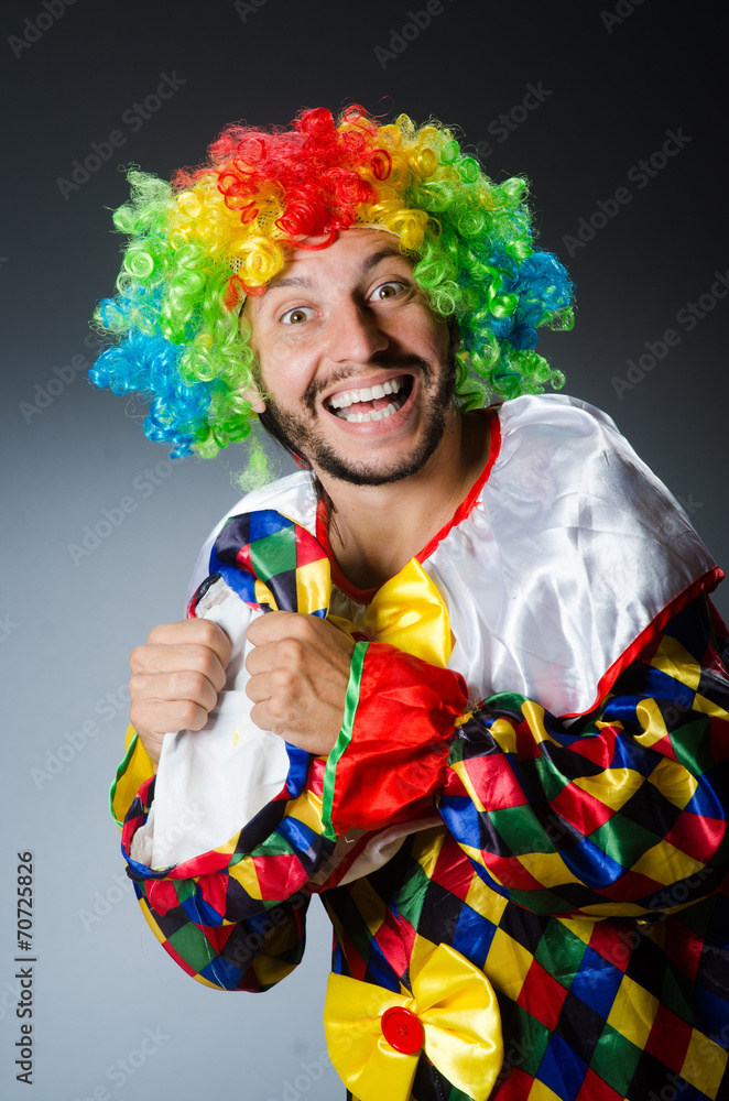 Funny clown in colourful costume Funny clown in colourful costume