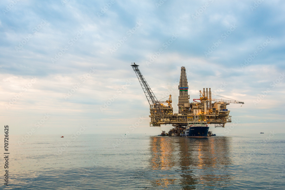 Oil rig platform in the calm sea