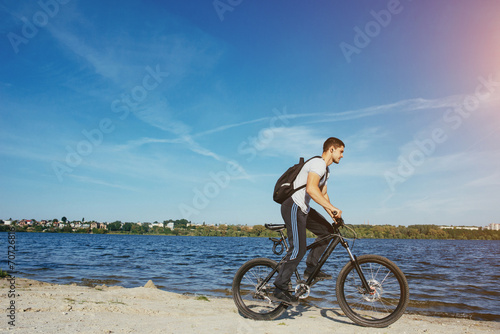 man on bike photo