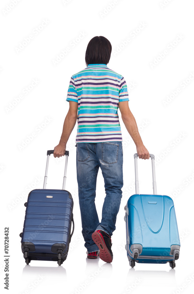 Young man travelling with suitcases isolated on white Young man travelling with suitcases isolated on white
