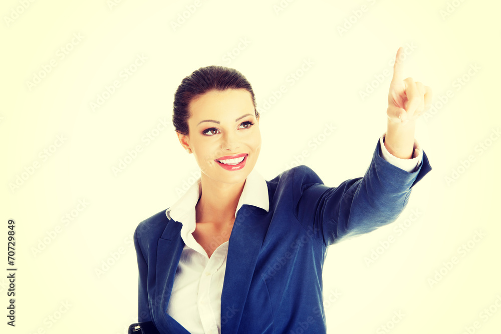 Businesswoman making choose on abstract screen Businesswoman making choose on abstract screen