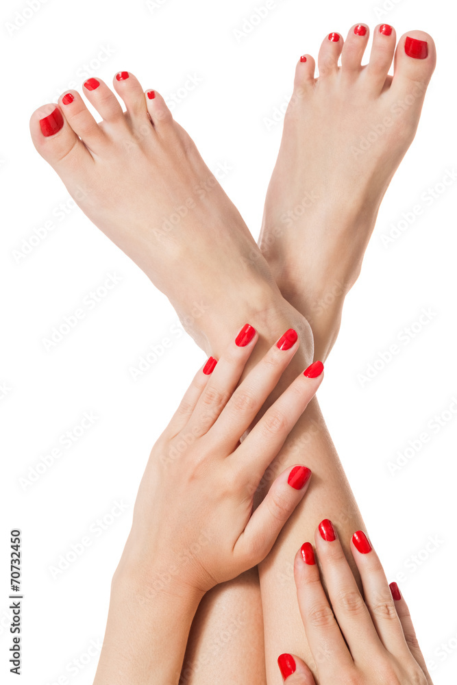 Woman with beautiful red finger and toenails Woman with beautiful red finger and toenails