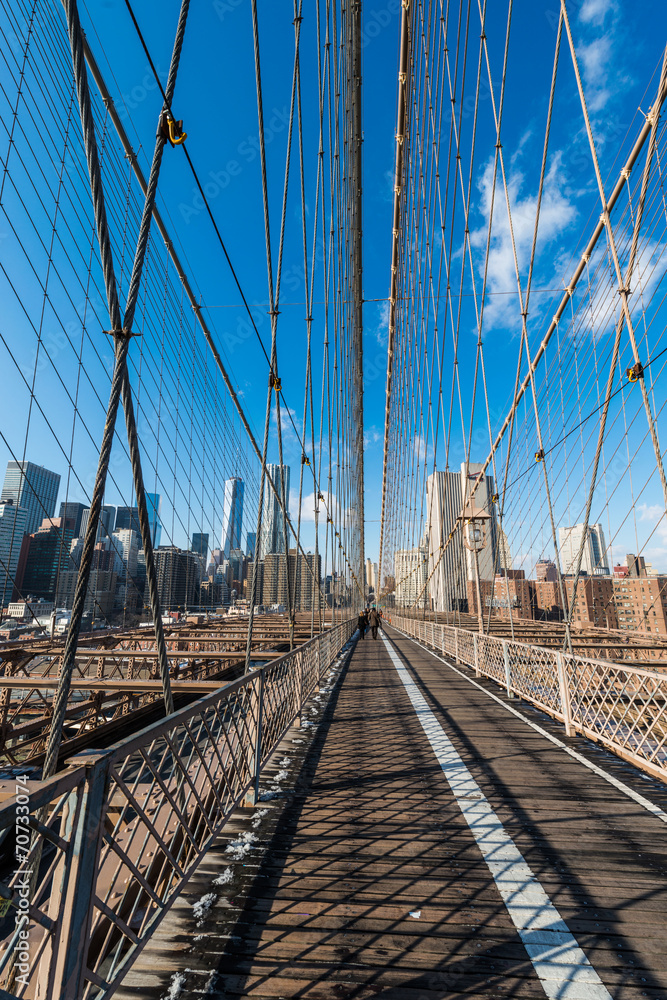 Naklejka premium View of lower manhattan from Brooklyn bridge