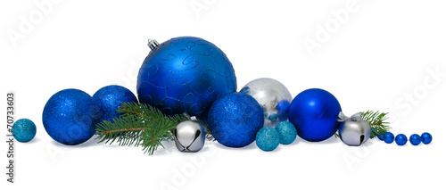 Christmas Baubles with young Spruce tree branches isolated on wh