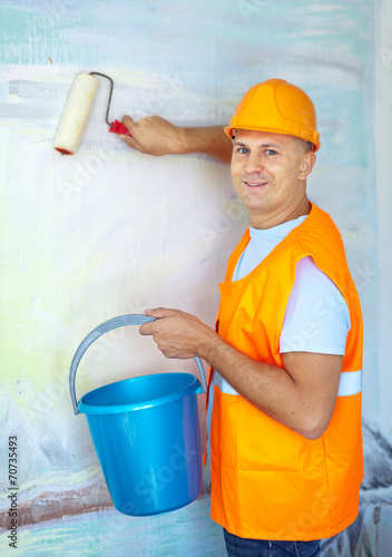 house painters with paint roller