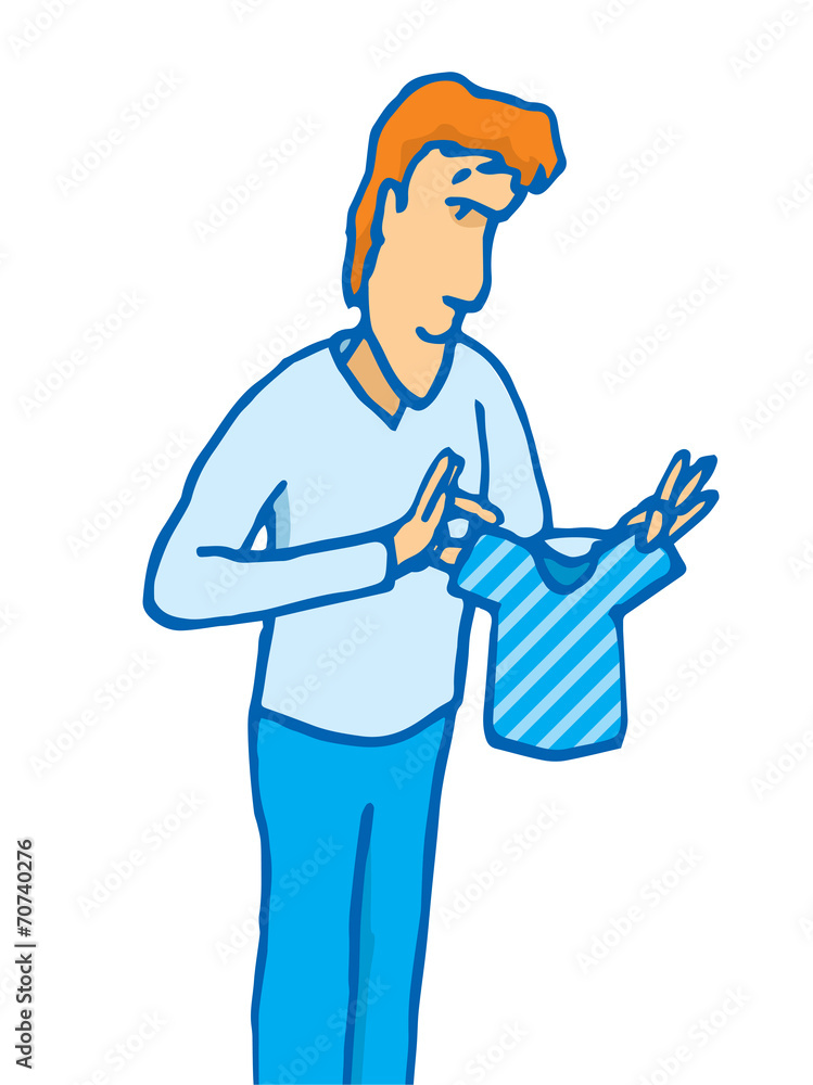 Man holding a tiny shirt Man holding a tiny shirt