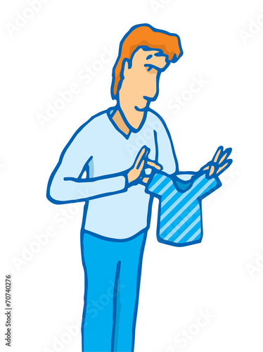 Man holding a tiny shirt
