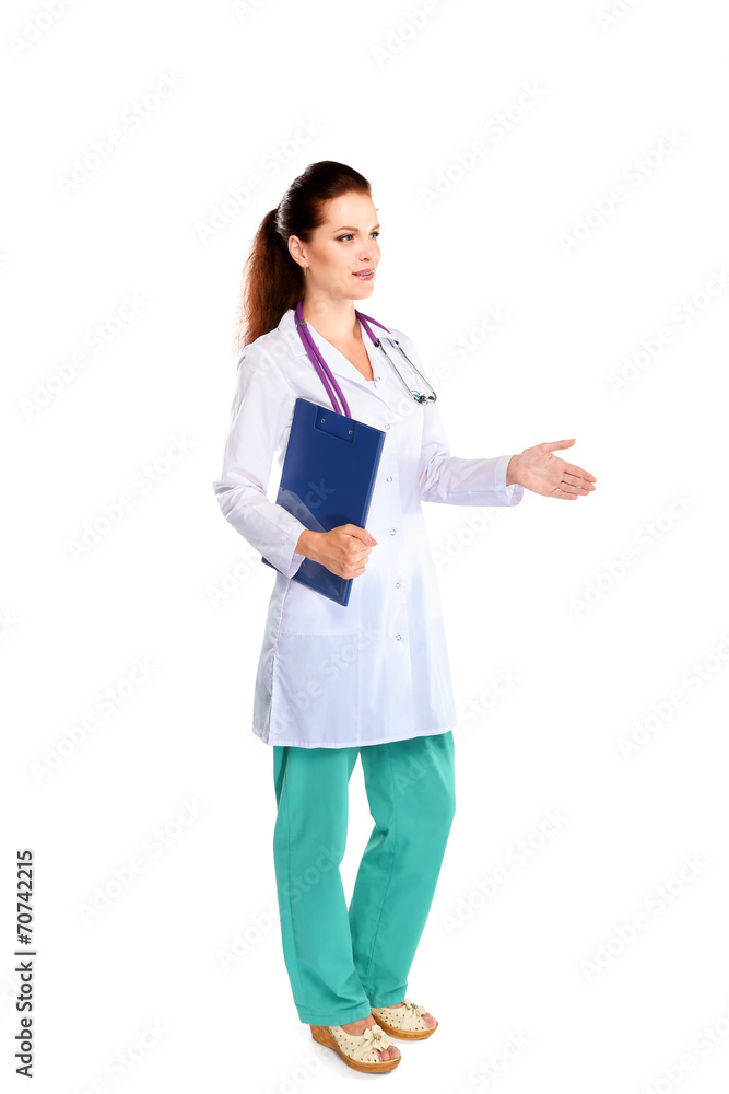 Smiling female doctor with a folder in uniform standing at Smiling female doctor with a folder in uniform standing at